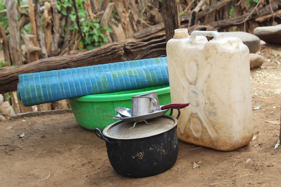Pots and pans, bucket, sleeping math and jerry cans were given to Abera’s family by People in Need.   