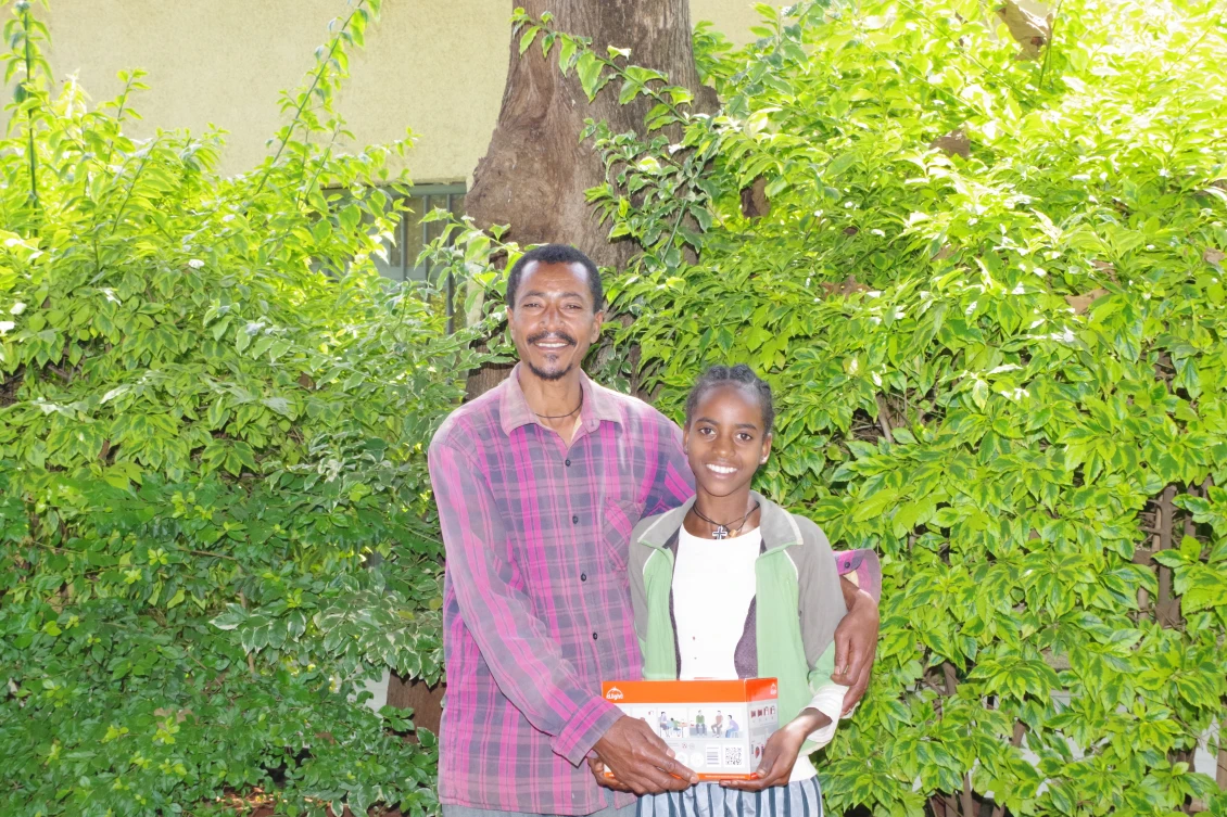 Mulatuwa with her father Zelalem. He was very sad when she had to end her education. 