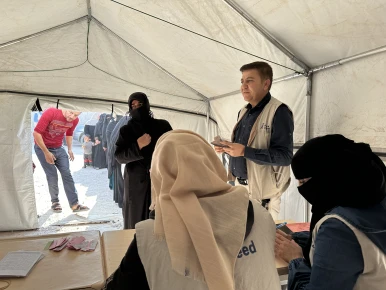 Distribution of Humansis food vouchers in Atasay camp for IDPs in northwest Syria.