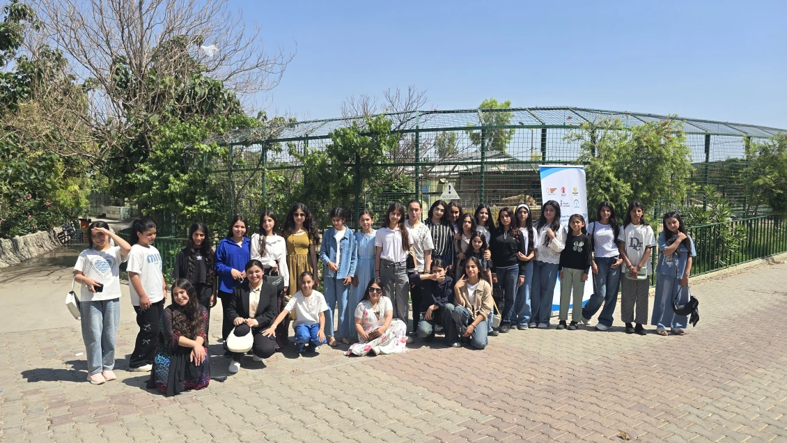 A group photo in Erbil ZOO, where students learned and had fun as part of the project activity.