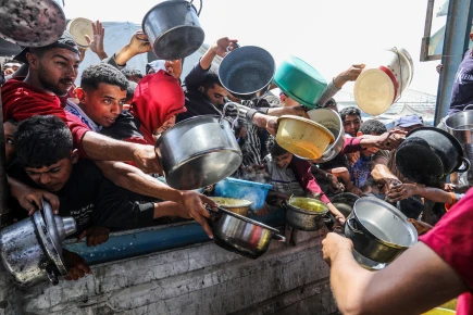 Palestinians receive hot meals (takiya) from a charity kitchen to be distributed to displaced people in Al-Mawasi, Khan Yunis, southern Gaza Strip, on May 3, 2025.
2622301321
Palestinians receive hot meals (takiya) from a charity kitchen distributing food to displaced people in Al-Mawasi, Khan Yunis, southern Gaza Strip, May 3, 2025.