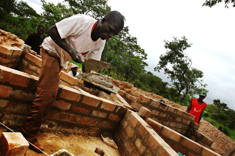 Construction of schools and teacher training