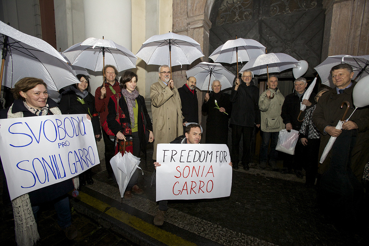 March in White crosses the Charles Bridge in Prague