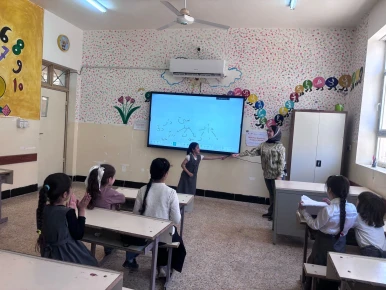 Students in one of the remedial classes are supported by People in Need.