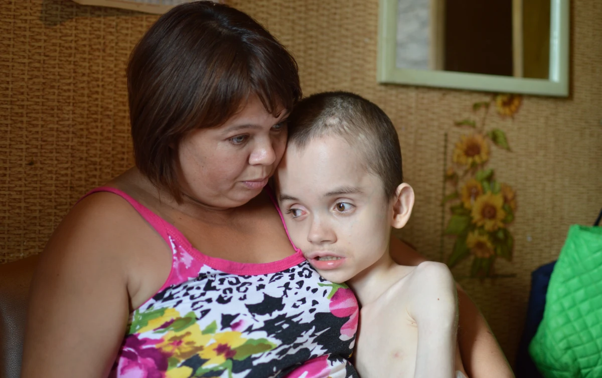 “Meat is special food on our table,” Olga says as she describes her life with her disabled son close to the Eastern Ukraine front line