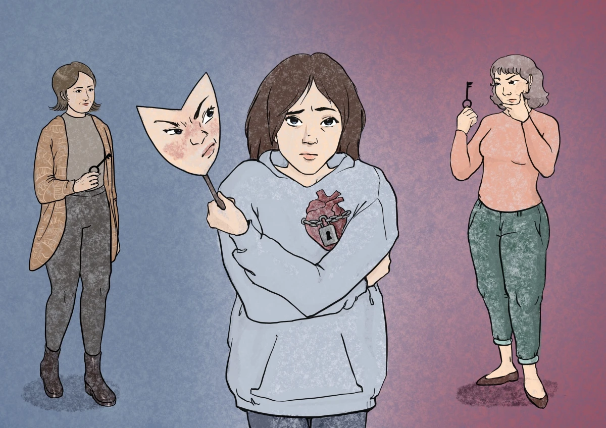 Jana holds up a mask to indicate that how she presents externally is not how she feels inside