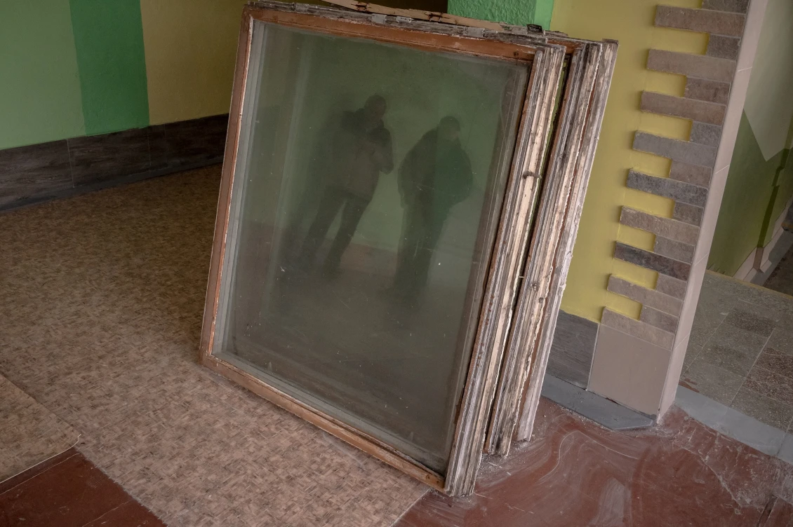 The old wooden windows that were in school before the repairs. 
