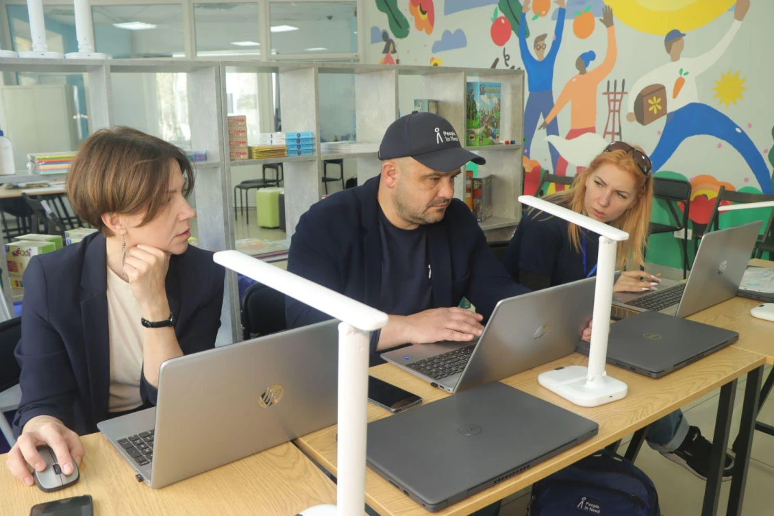 Nataliia Kozmenko with her colleagues