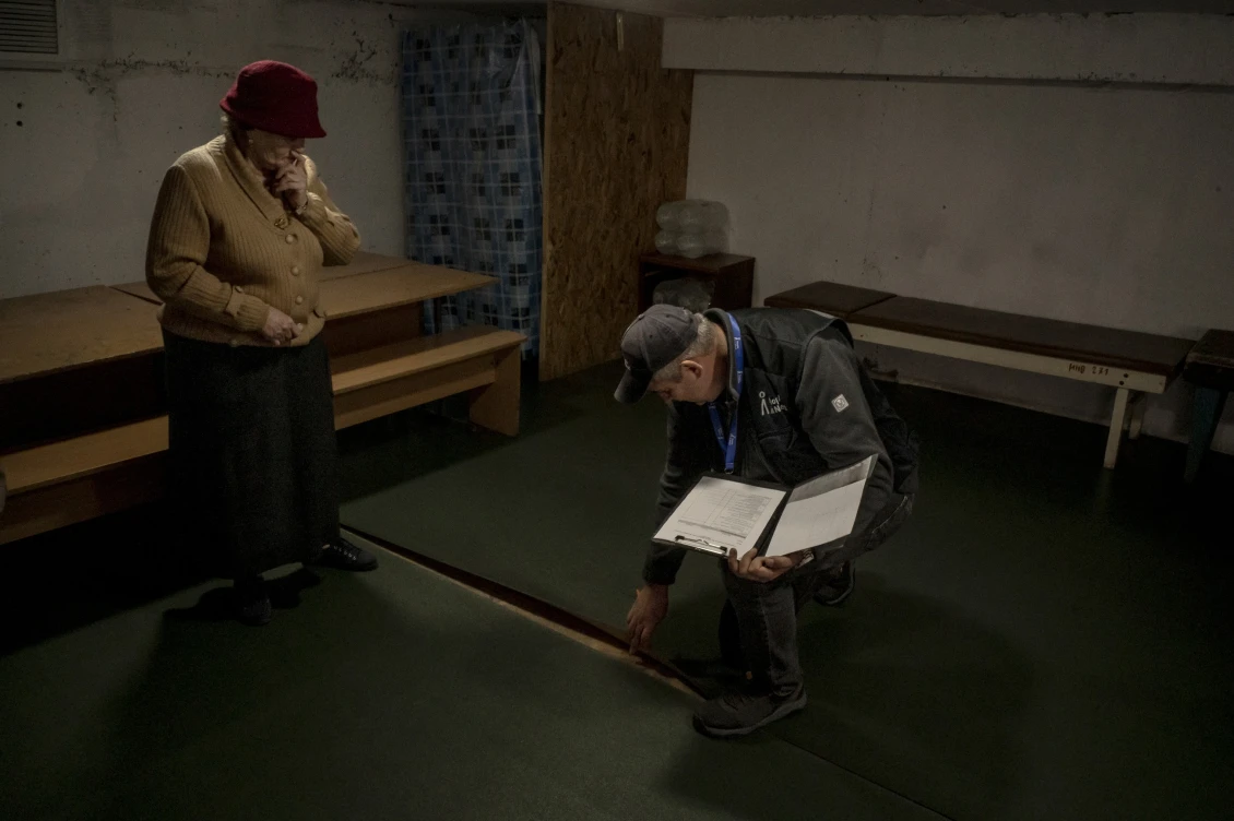 The centre’s director, Iryna Matviienko, shows us the shelter; presently, it is unsuitable for long periods of use