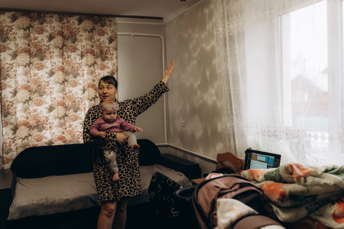 Alyona shows the children's room, which was repaired with the funds we provided. 
