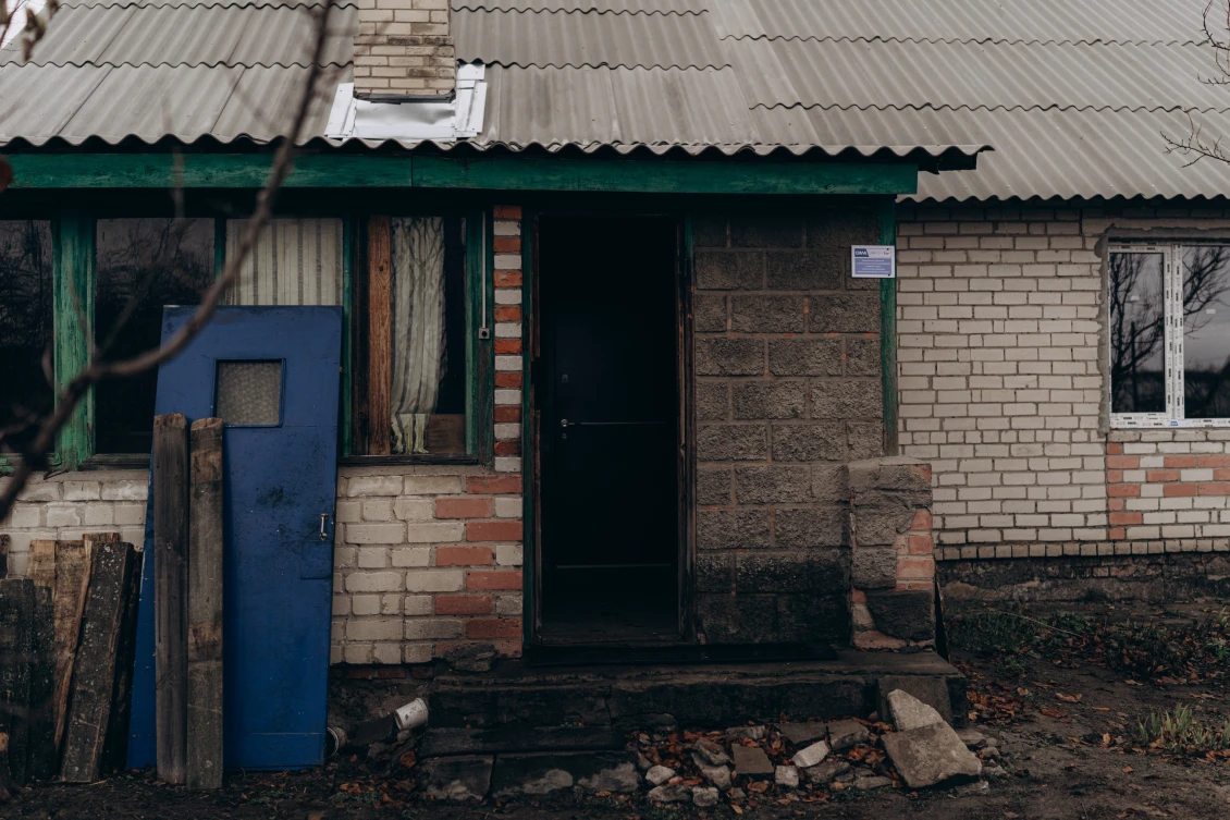 A sticker on one of the houses we repaired. In total, we helped 24 families in Olizarivka to restore their homes. 