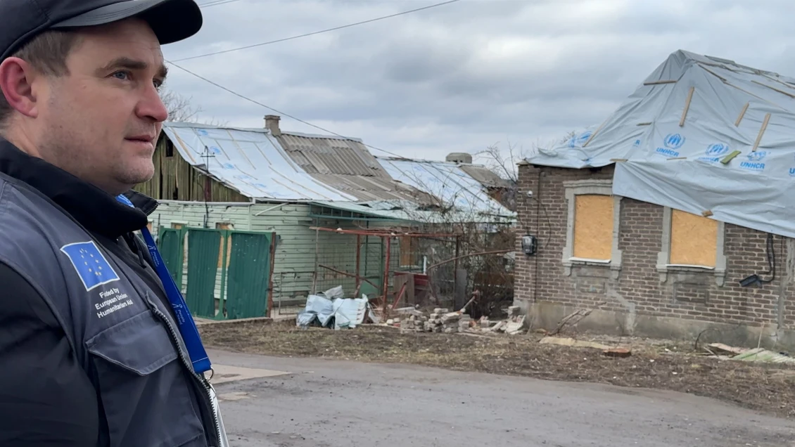 A People in Need engineer assessing the damage to homes in Bilenke