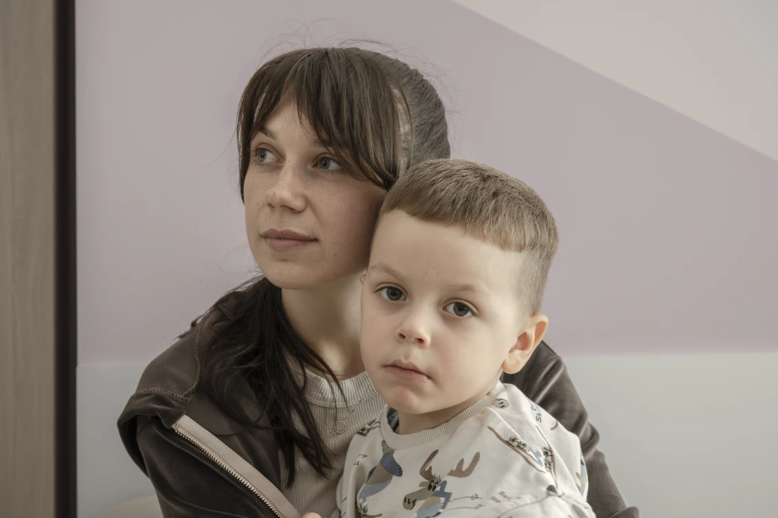 Lev and his mother attending speech therapy