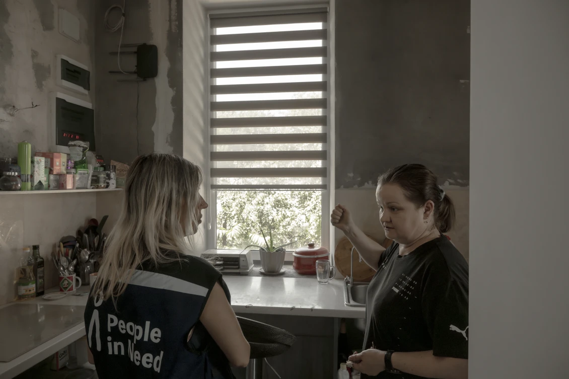 Anastasia shows the new windows that our support helped provide