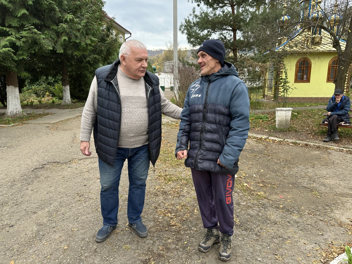 Oleksandr Kolesnikov, with one of the residents