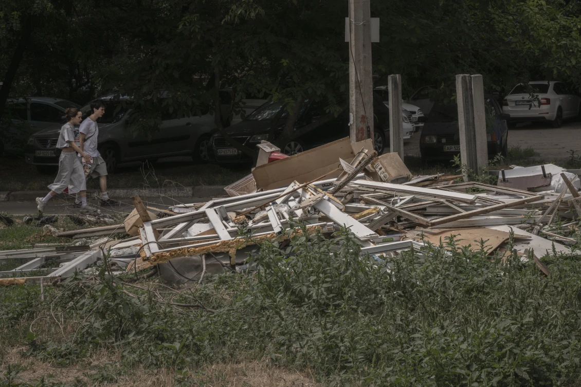 Piles of shattered windows are a common sight in the courtyards of apartment buildings in Zaporizhzhia