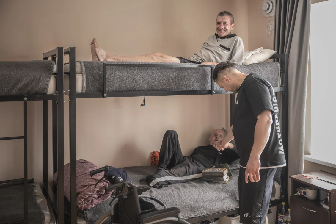 Artem visits the shelter's residents every day